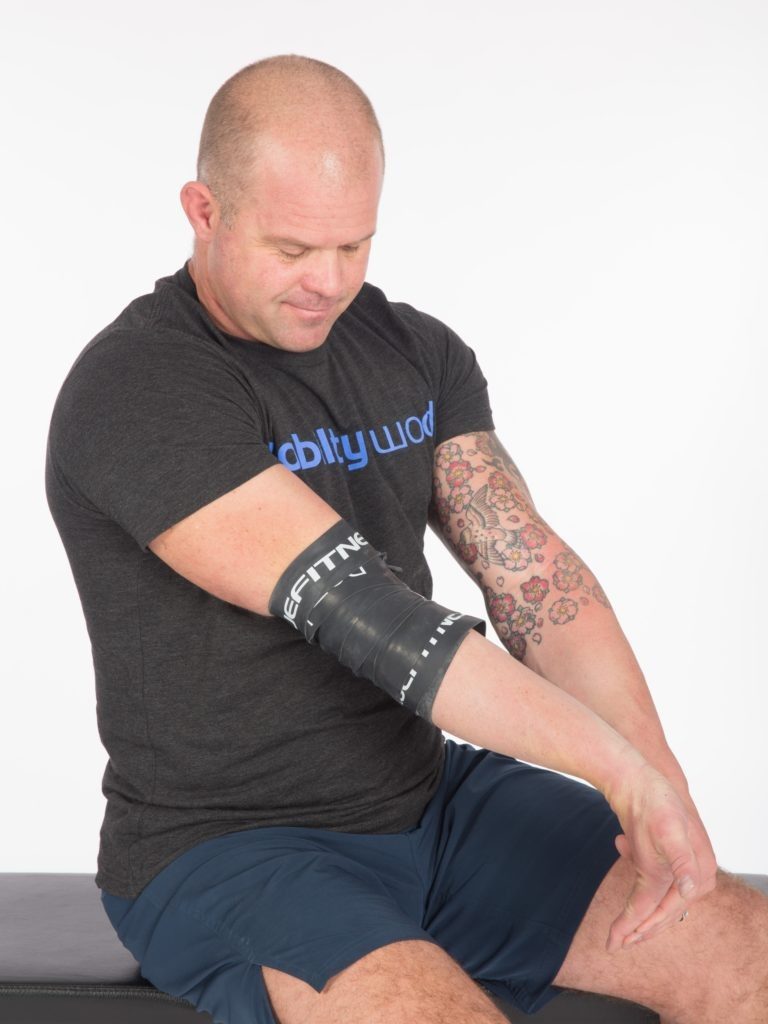 4. Elbow Voodoo Floss Flexion and Extension Hip Mobility Exercise Hip Capsule External Rotation