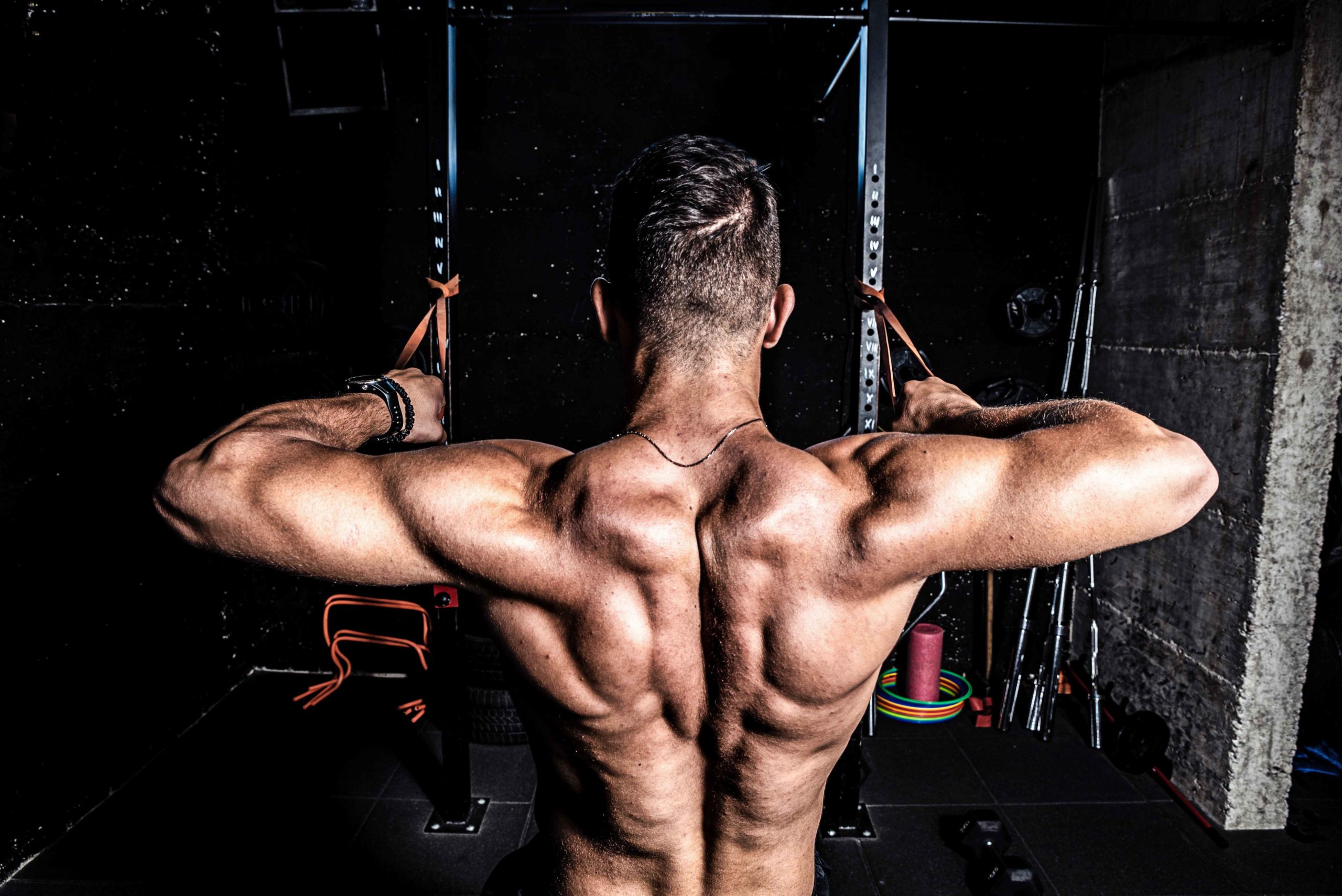Face Pulls Can Improve Your Posture strong muscular man doing the face pull exercise